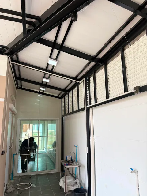 งานต่อเติมห้องหลังบ้านโครงเหล็กพร้อมฝ้าและไฟ